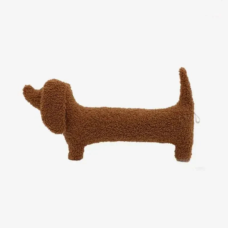 Brown plush dachshund-shaped pillow for cozy home decoration and support