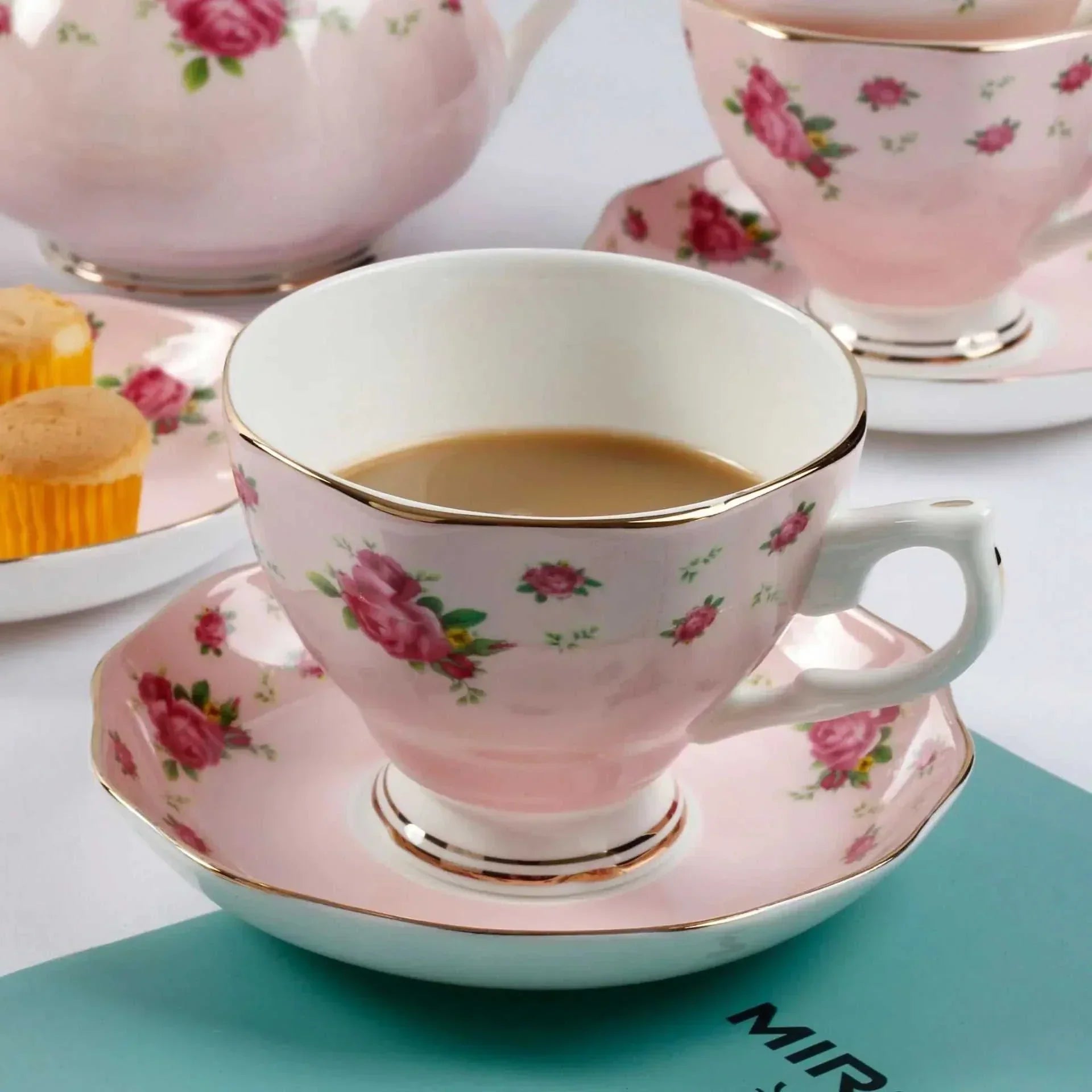 Bone China British Afternoon Tea Set with pink floral tea cup and saucer featuring elegant gold trim