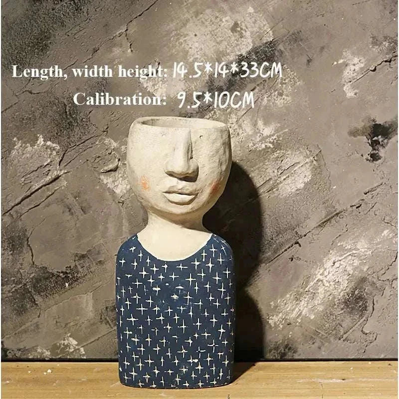 Artistic Portrait Sculpture planter with abstract face design in blue patterned body, cement material, 33cm tall decorative flower vase