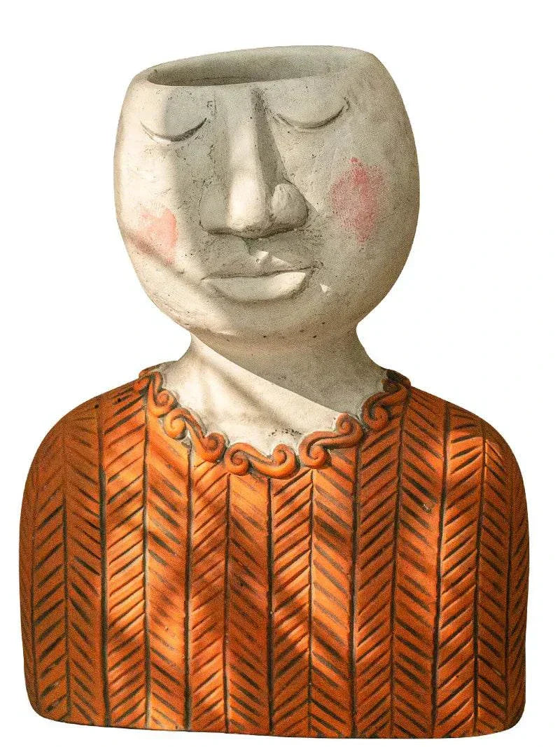 Artistic Portrait Sculpture planter in the shape of a serene face with an orange patterned shirt, made from durable cement.