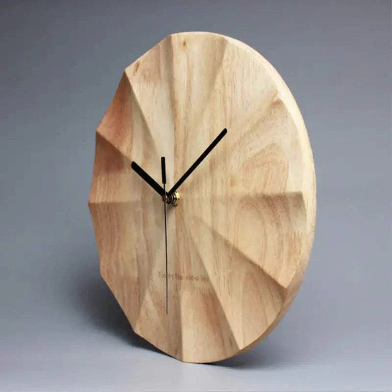 Nordic minimalist wooden wall clock with geometric carved design and black hands on natural wood finish