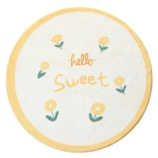 Round cartoon carpet for children's bedroom with yellow floral design and "hello sweet" text on soft polyester fiber