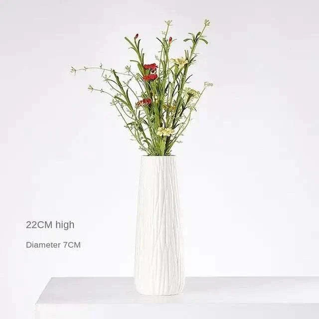 White Hemp Rope Ceramic Vase with natural texture and minimalist design, 22cm high and 7cm diameter, holding decorative flowers