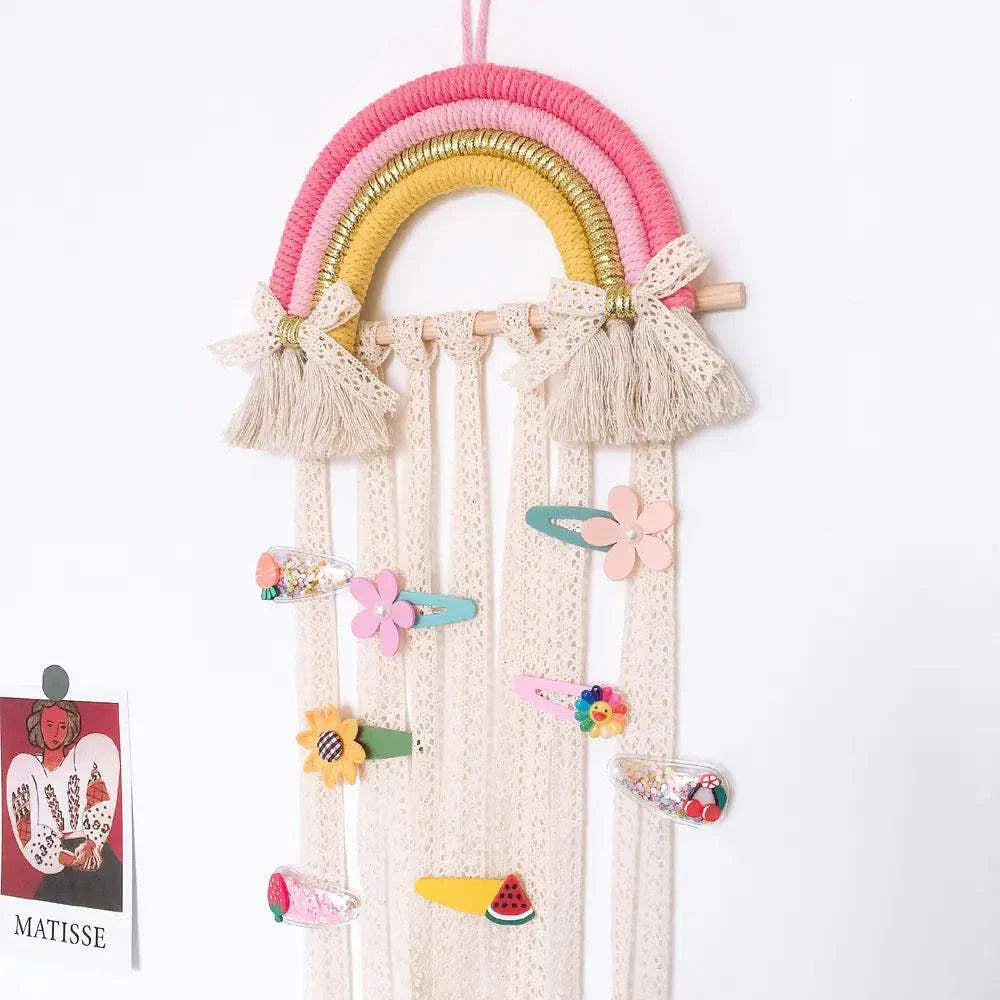 Nordic style woven rainbow hair clip organizer rack with colorful clips and fabric tassels