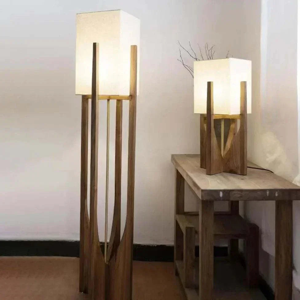 Retro style bedroom bedside wooden table lamps with fabric shades providing warm ambient lighting