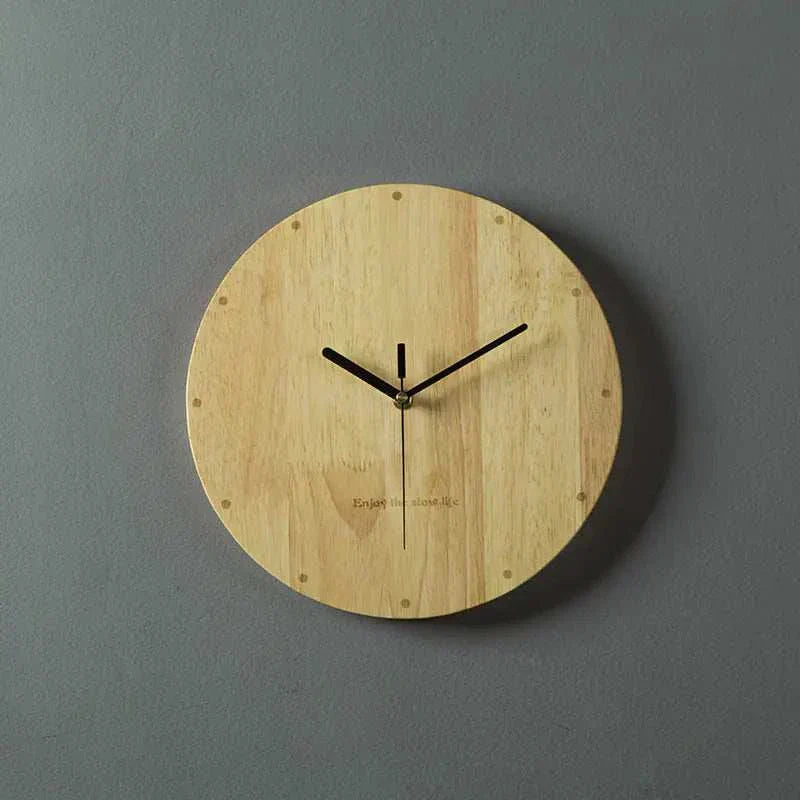 Nordic minimalist wooden wall clock with a 30CM diameter, natural wood finish, and black hands mounted on a gray wall.