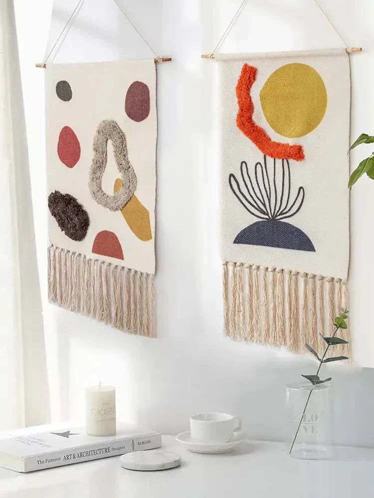Handcrafted woven tapestry wall hangings with geometric patterns and tassels for cozy home decor